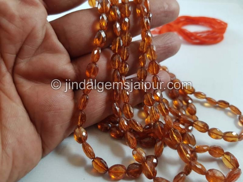 Spessartite Faceted Oval Beads